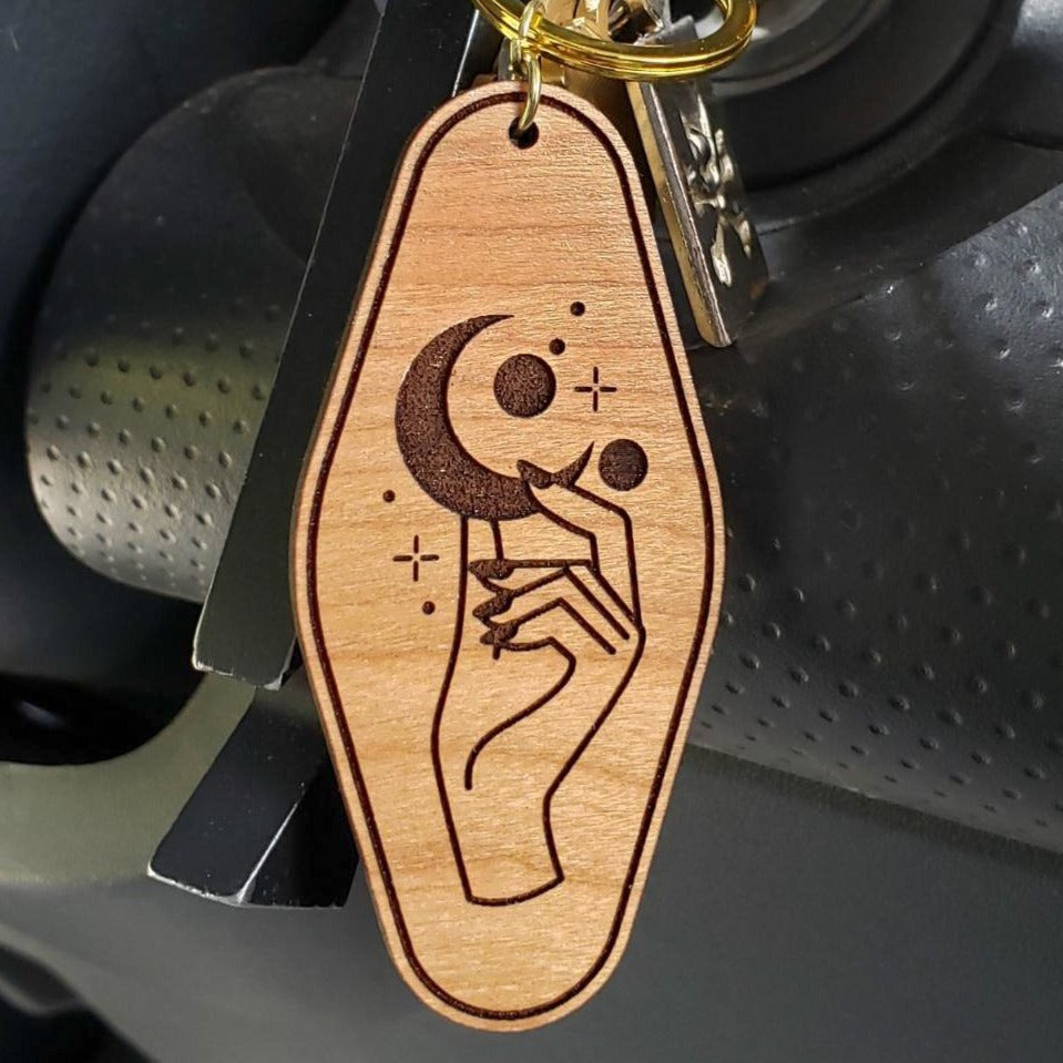 She Holds the Moon Wood Hotel Keychain